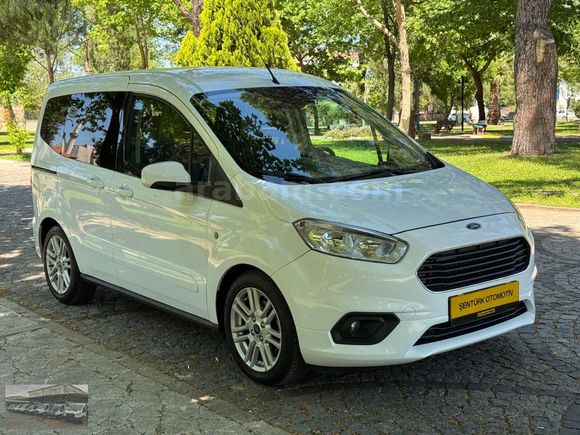 ŞENTÜRK'TEN 2023 OTOMOBİL COURİER TİTANİUM CAMLI VAN 30DK KREDİ