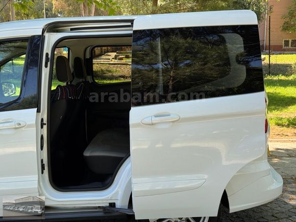 ŞENTÜRK'TEN 2023 OTOMOBİL COURİER TİTANİUM CAMLI VAN 30DK KREDİ