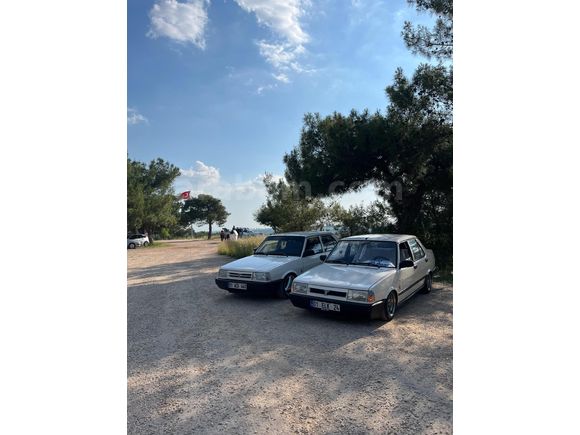 Doğan S 1995 Model  değişensiz  parça parça boya vardır üstten dolu araçtır vize 2 yıl var ses sistemi Amerikan Park 4.5 cm kısa traves vardır