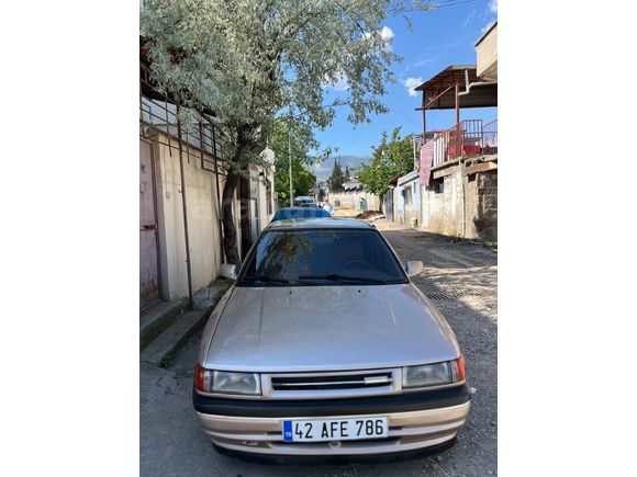 Sahibinden Mazda 323 1.6 1992 Model Kahramanmaraş 215.000 km Altın