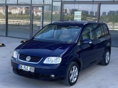 2.SAHİBİNDEN 2004 MODEL TOURAN 1.6 HİGHLİNE OTOMATİK 7 KİŞİLİK