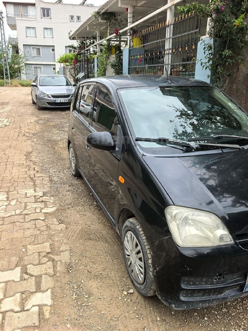 Sahibinden Daihatsu Cuore 1.0 Low Grade 2007 Model Hatay 172.000 km Siyah 4