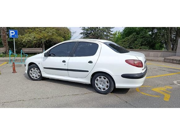 Sahibinden Peugeot 206 1.4 Comfort sedan 2010 Model  Tüplü 147.000 km  Beyaz