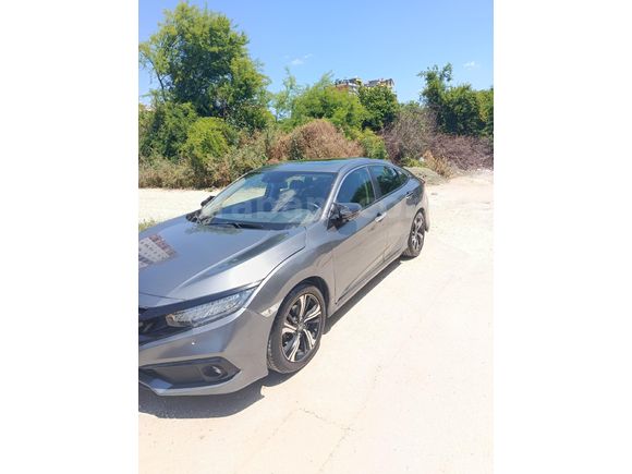 Ağır hasarlı 2020 çıkışlı Honda Civic 1.6i VTEC Executive 98.500 km Gri