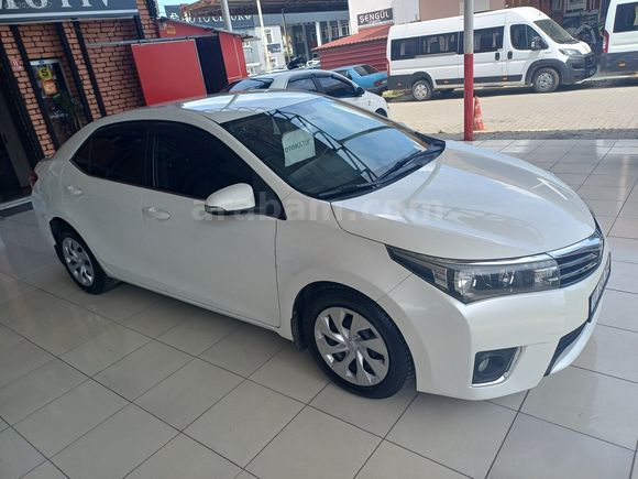 GÜLDALI'DA 2014MODEL 128000KM'DE BOYASIZ DİZEL OTOMATİK COROLLA