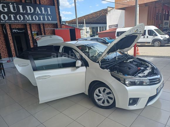 GÜLDALI'DA 2014MODEL 128000KM'DE BOYASIZ DİZEL OTOMATİK COROLLA