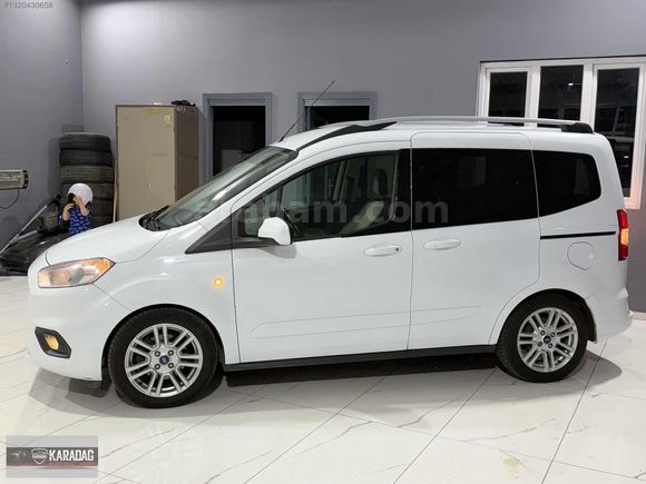 2022 COURİER OTOMOBİL TITANIUM 154 BİN KM DE
