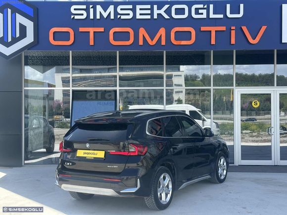 ŞİMŞEKOĞLU'DAN 2024 BMW İX1 HATASIZ TRAMERSİZ MOCHA DERİ %20 KDV