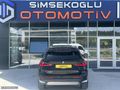 ŞİMŞEKOĞLU'DAN 2024 BMW İX1 HATASIZ TRAMERSİZ MOCHA DERİ %20 KDV