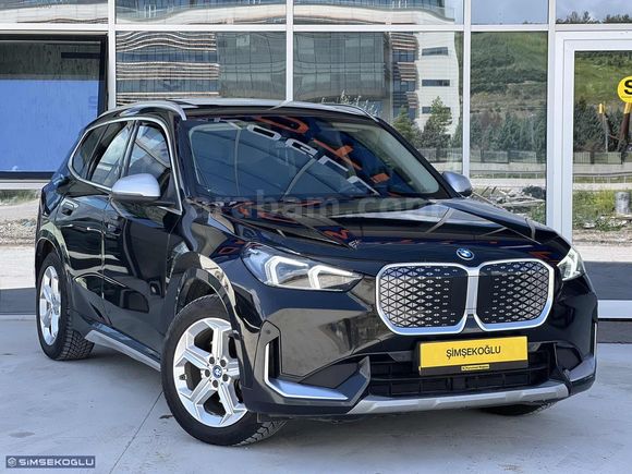 ŞİMŞEKOĞLU'DAN 2024 BMW İX1 HATASIZ TRAMERSİZ MOCHA DERİ %20 KDV
