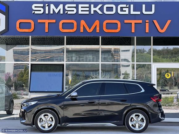 ŞİMŞEKOĞLU'DAN 2024 BMW İX1 HATASIZ TRAMERSİZ MOCHA DERİ %20 KDV