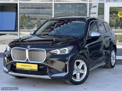 ŞİMŞEKOĞLU'DAN 2024 BMW İX1 HATASIZ TRAMERSİZ MOCHA DERİ %20 KDV