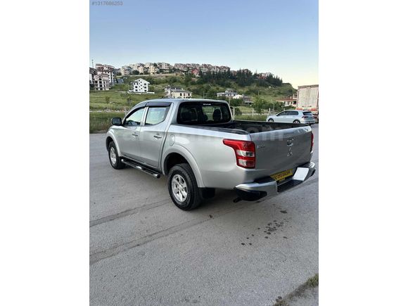 MİTSUBİSHİ L 200 FUL ORJINAL KOÇ OTO GALERİ