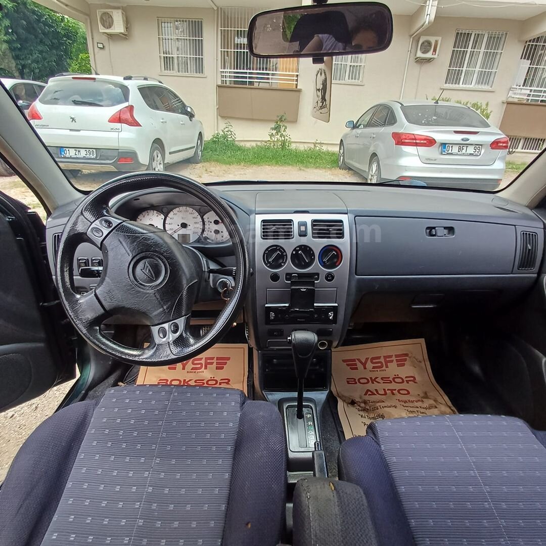 Sahibinden Daihatsu Sirion 1.3 Touring 2003 Model Adana 385.000 km Yeşil (metalik) 5