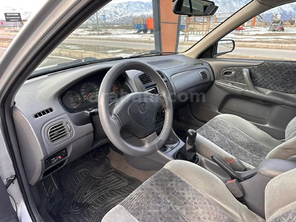 DEĞİŞENSİZ DÜŞÜK KM MAZDA 323