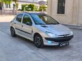 ÜMİT AUTO/2001/CAM TAVAN/PEJO/206/XT/BENZİN LPG/