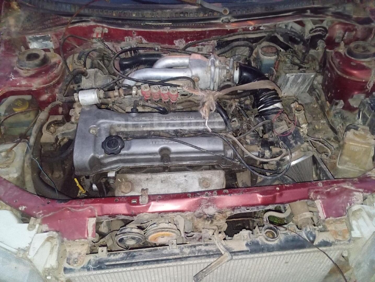 1998 model Mazda 323 1.5 pıratika 2 cam otomatik koltuklarında sadece sag koltukta küçük bi yırtık var klima çalışıyor 6