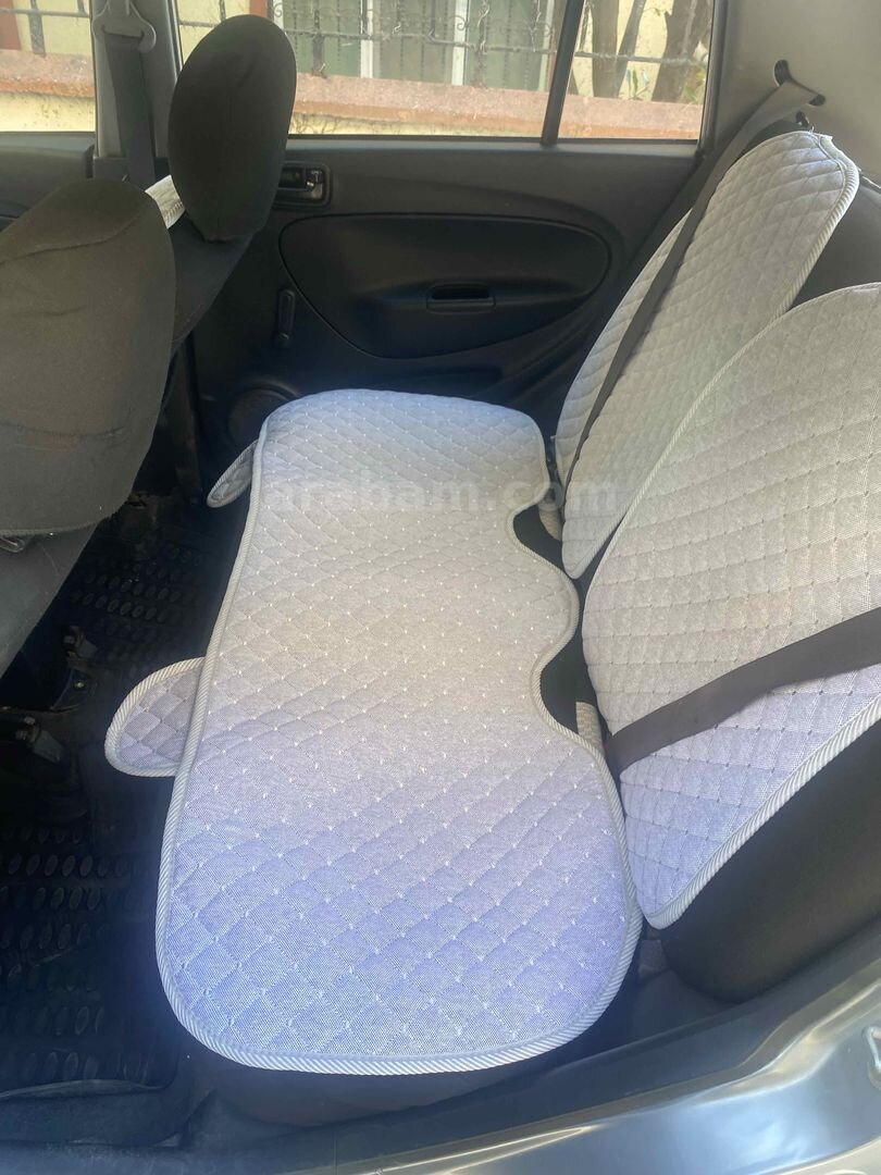 Sahibinden Daihatsu Cuore 1.0 Low Grade 2004 Model İstanbul 195.000 km Gri (Gümüş) 7