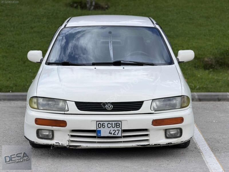 Galeriden Mazda 323 1.8 1997 Model Çorum 310.000 km Beyaz