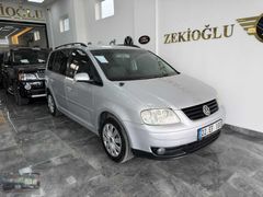 2004 VOLKSVSGAENN TOURAN