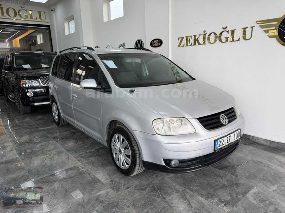2004 VOLKSVSGAENN TOURAN