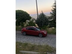 Sahibinden Mazda 3 1.6 Dynamic 2005 Model  390.000 km Kırmızı
