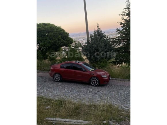 Sahibinden Mazda 3 1.6 Dynamic 2005 Model  390.000 km Kırmızı