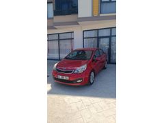 Sahibinden Kia Rio 1.4 CVVT Fancy 2014 Model  124.000 km Bordo