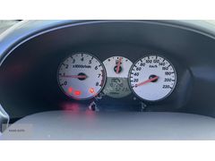 TEMİZ 2009 NİSSAN MİCRA PASSİON 1.2 TAM OTOMATİK 100.000 KM