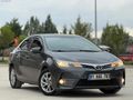 COROLLA 1.6 ADVANCE EN DOLUSU
