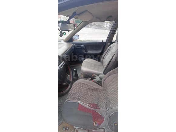 ÇEKME BELGELİ MAZDA 323 1.6 GLX