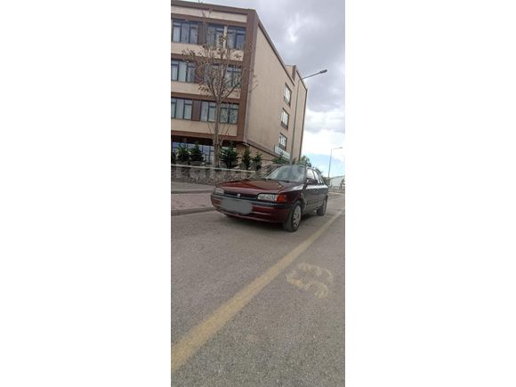 ÇEKME BELGELİ MAZDA 323 1.6 GLX