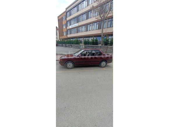 ÇEKME BELGELİ MAZDA 323 1.6 GLX