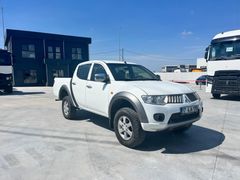 KOÇASLANLAR2 MİTSUBİSHİ L200 4X2 MANUEL VİTES 2011 MODEL