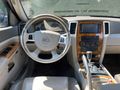 2009 MODEL GRAND CHEROKEE. SUNROOFLU