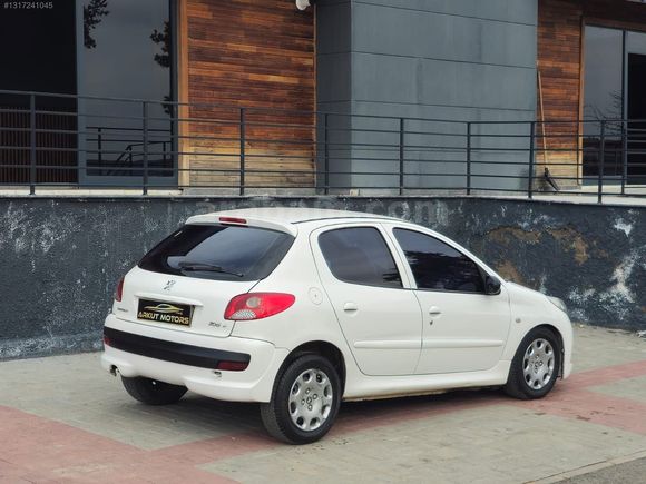 ArkutMotors'dan masrafsız makyajlı kasa 206 +