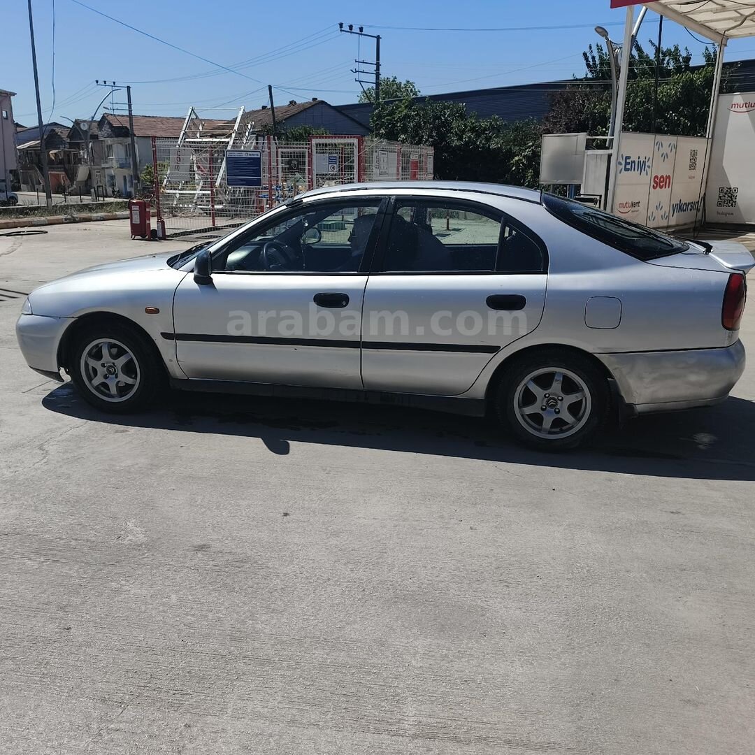 Sahibinden Mitsubishi Carisma 1.6 GLX 1999 Model Kocaeli 289.000 km Gri (Gümüş) 5