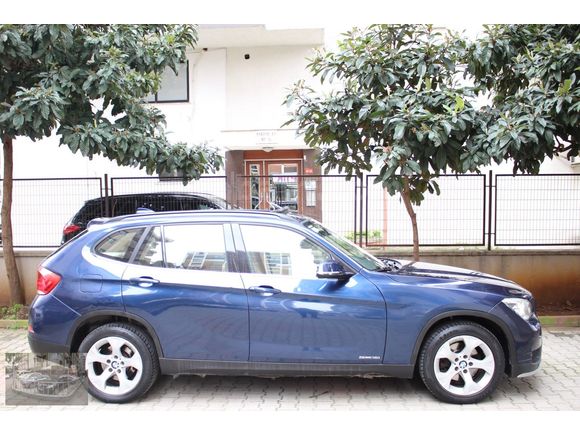 2015_BMW_X 1__1,6i_sDrive_91,000km de