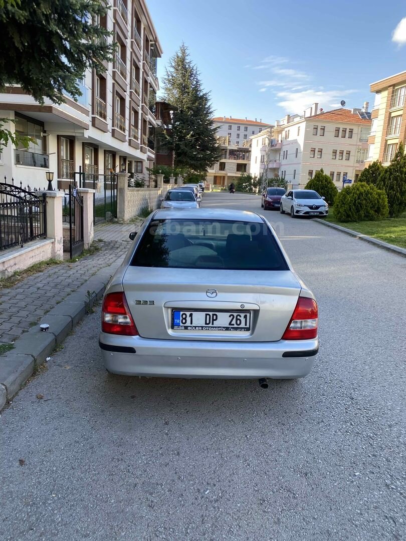 MEMURDAN TEMİZ MAZDA 323 4