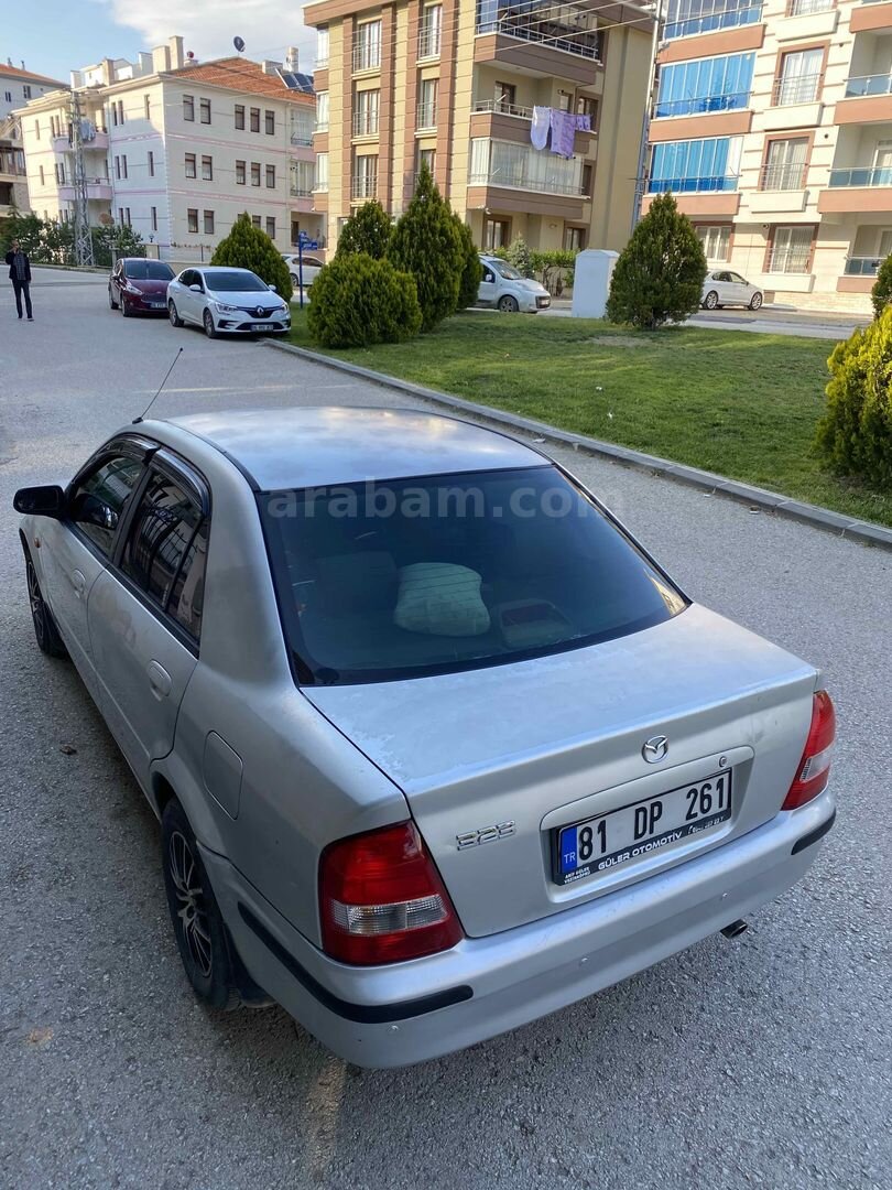 MEMURDAN TEMİZ MAZDA 323 3
