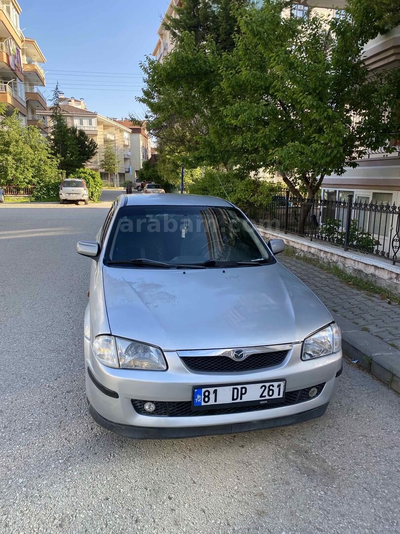 MEMURDAN TEMİZ MAZDA 323 1