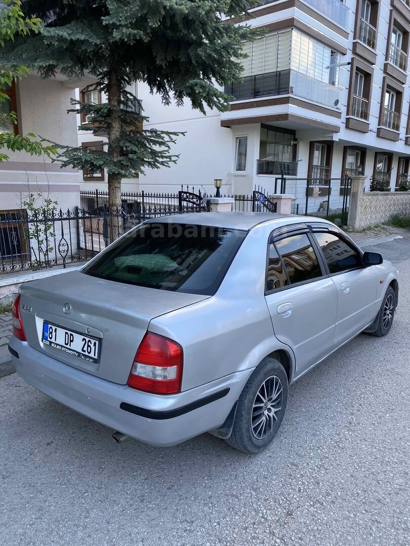 MEMURDAN TEMİZ MAZDA 323 5