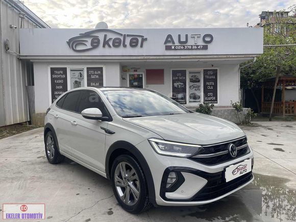 EKELER'DEN 560BİN PEŞİN,KALAN 48AY-2023 TAİGO 1.0 R-LİNE HATASIZ
