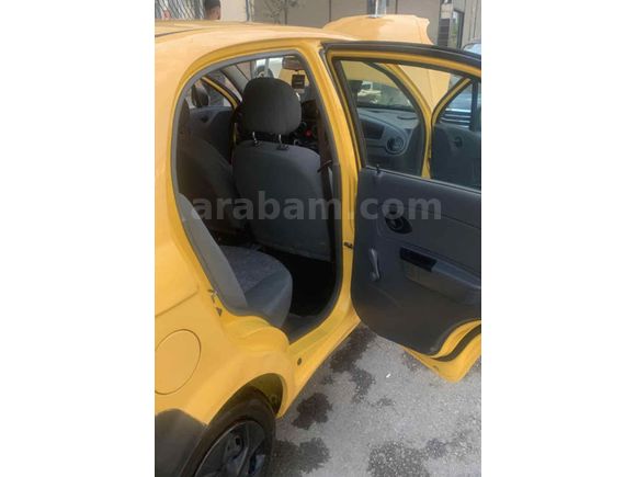 Tertemiz 2006 model Spark sarı renk benzin LPG 
