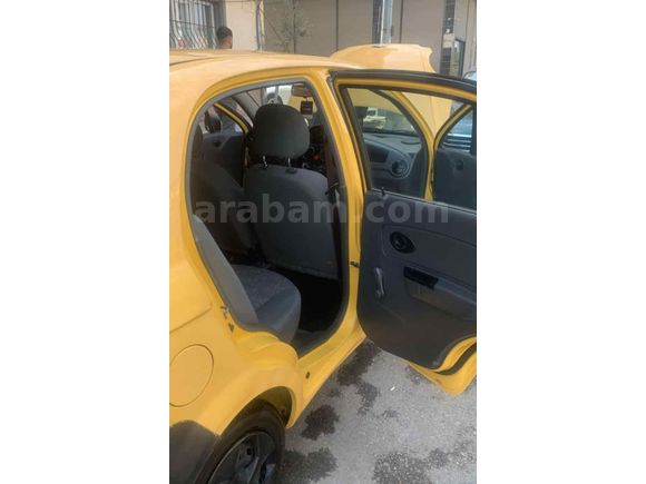 Tertemiz 2006 model Spark sarı renk benzin LPG 