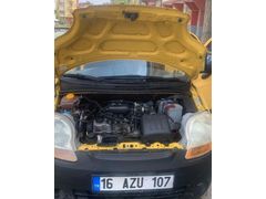 Tertemiz 2006 model Spark sarı renk benzin LPG 