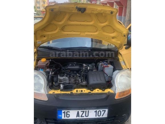 Tertemiz 2006 model Spark sarı renk benzin LPG 