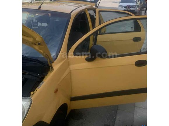 Tertemiz 2006 model Spark sarı renk benzin LPG 