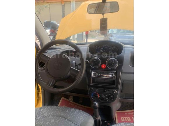 Tertemiz 2006 model Spark sarı renk benzin LPG 