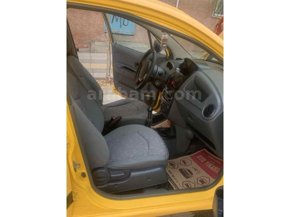 Tertemiz 2006 model Spark sarı renk benzin LPG 